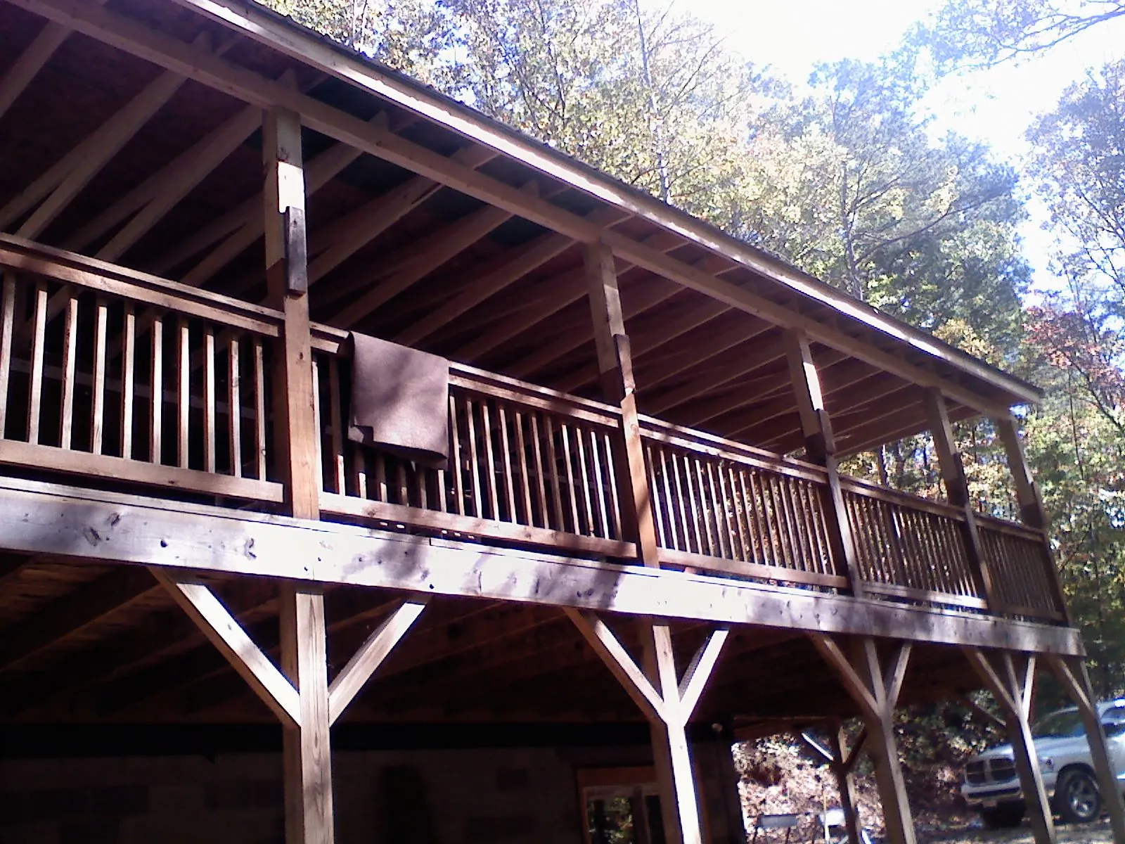 Timber framing under a new elevated porch and deck — Roof Leak Repair in New Ross by Roofing Brothers
